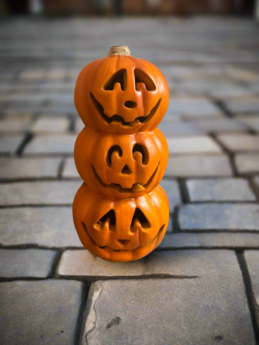 Stacked Jack O Lanterns light up