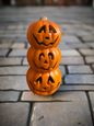Stacked Jack O Lanterns light up