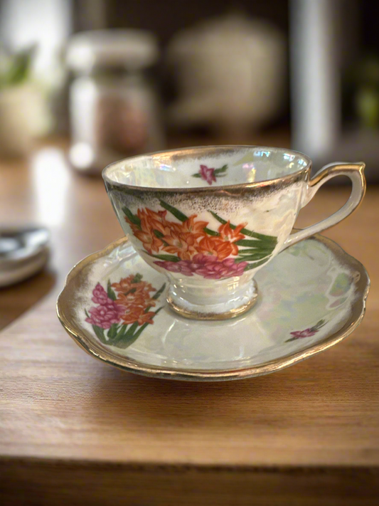 Hand-Painted Porcelain
Teacup and Saucer