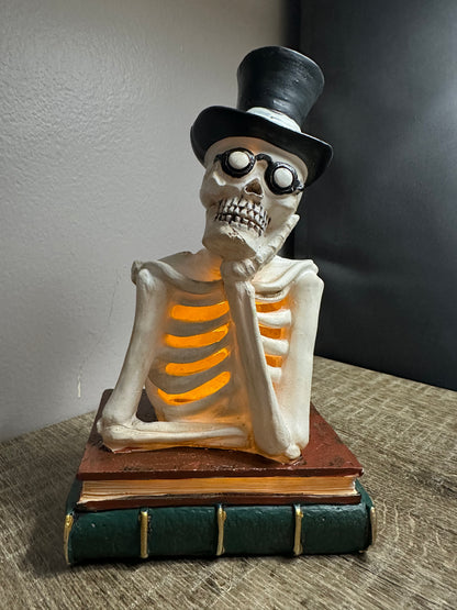 Skeleton With Top Hat & Books