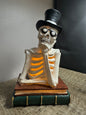 Skeleton With Top Hat & Books
