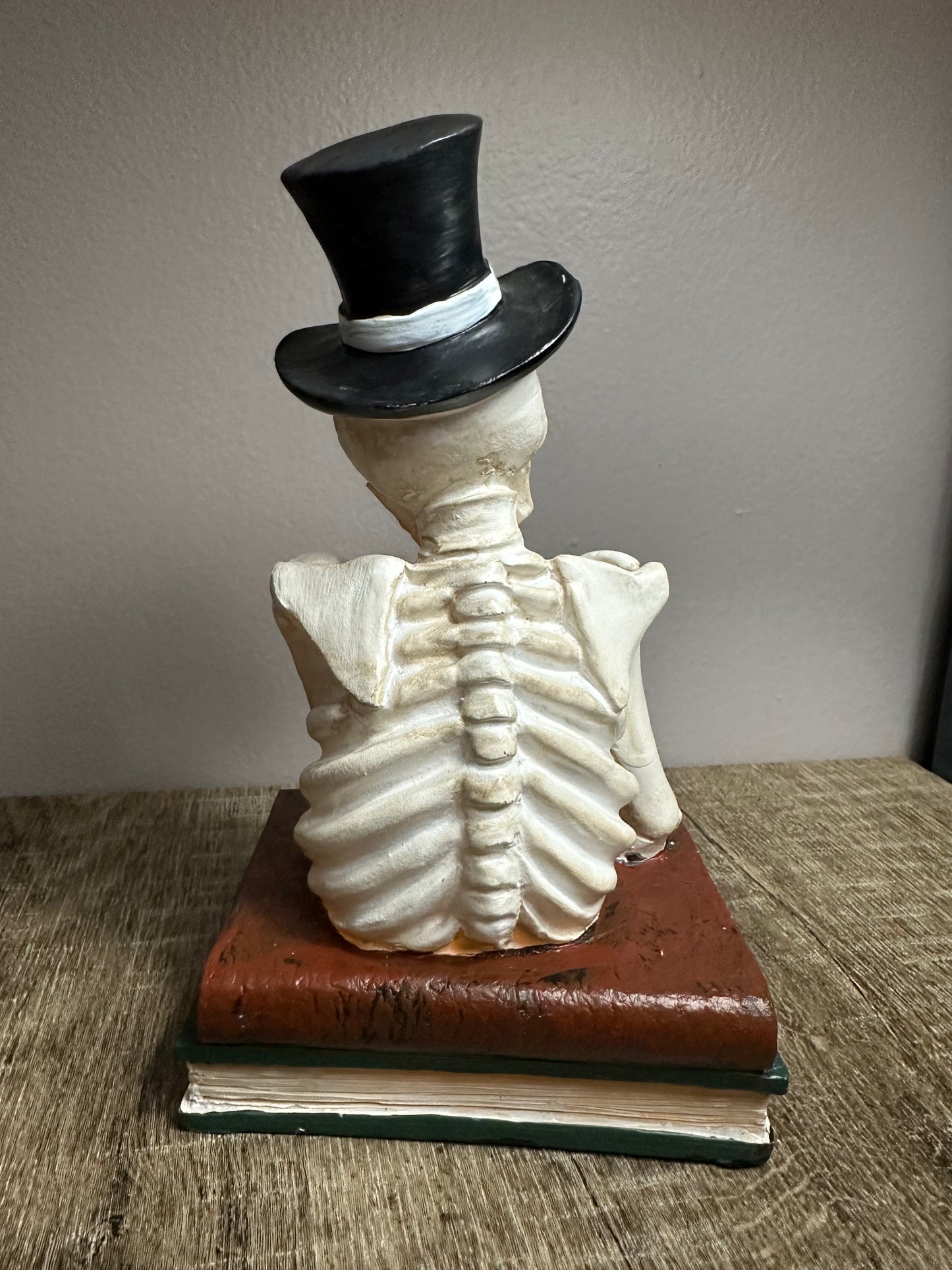 Skeleton With Top Hat & Books
